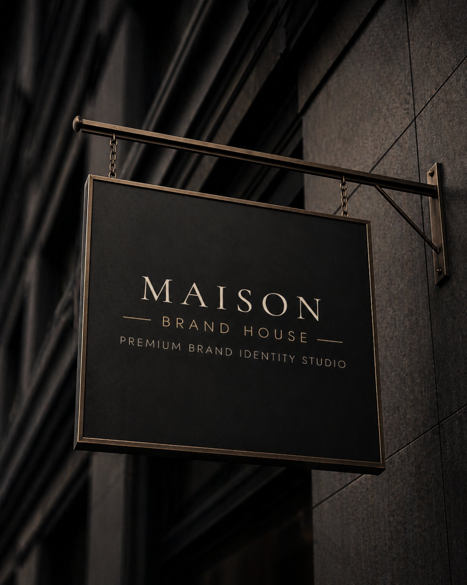 Maison Brand House exterior sign on dark stone facade